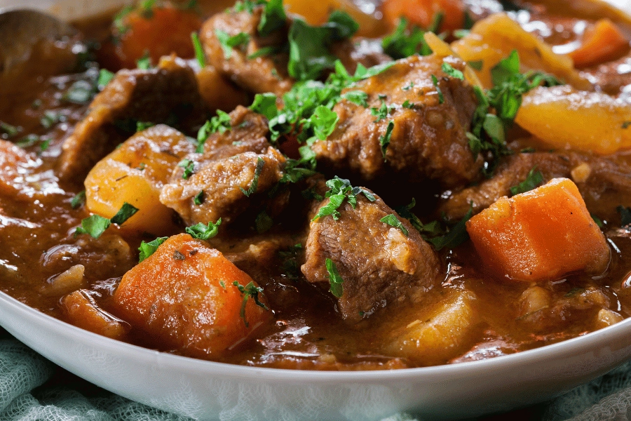 bowl of irish beef stew with potatoes and vegetables